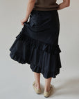 Noir Ruched + Ruffled Midi Skirt