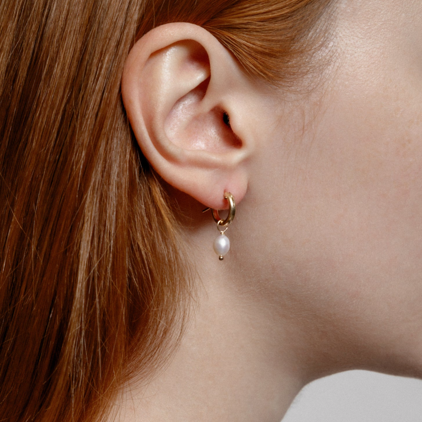 Protextor Parrish Threaded Pearl and Gold Hoop Earrings Protextor Parrish Threaded Pearl and Gold Hoop Earrings