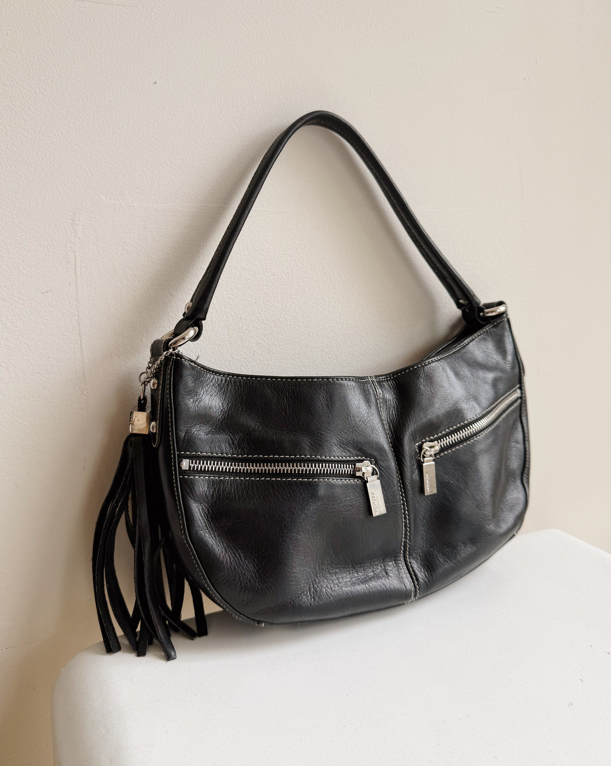 Raven Curved Leather Zip Shoulder Bag