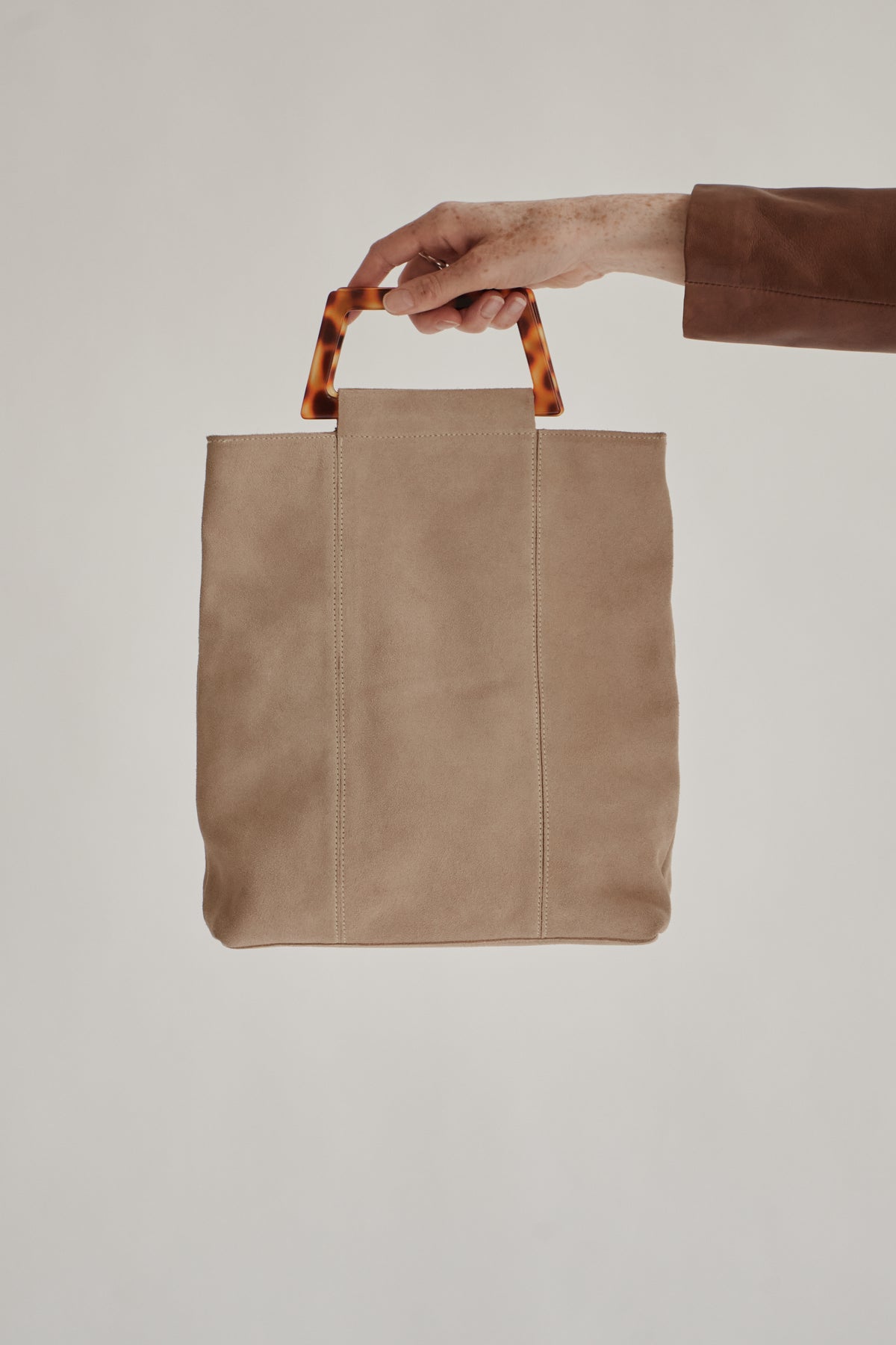 Stone Tortoise Handled Suede Bag
