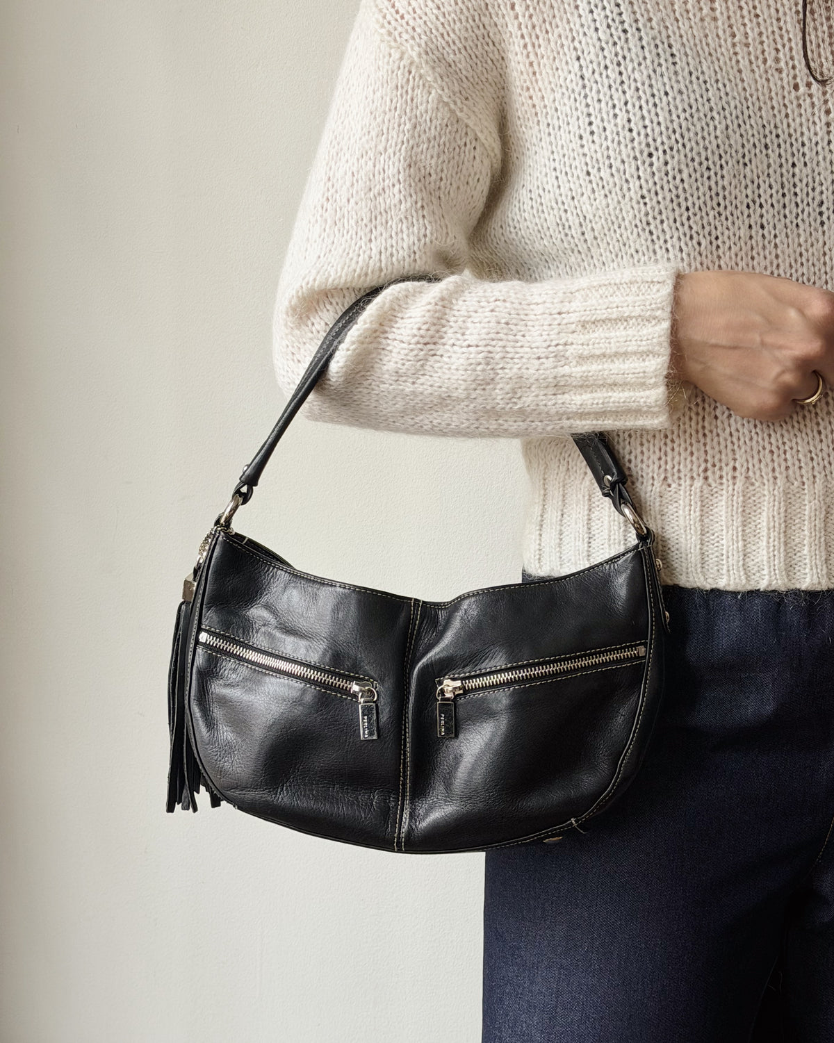 Raven Curved Leather Zip Shoulder Bag