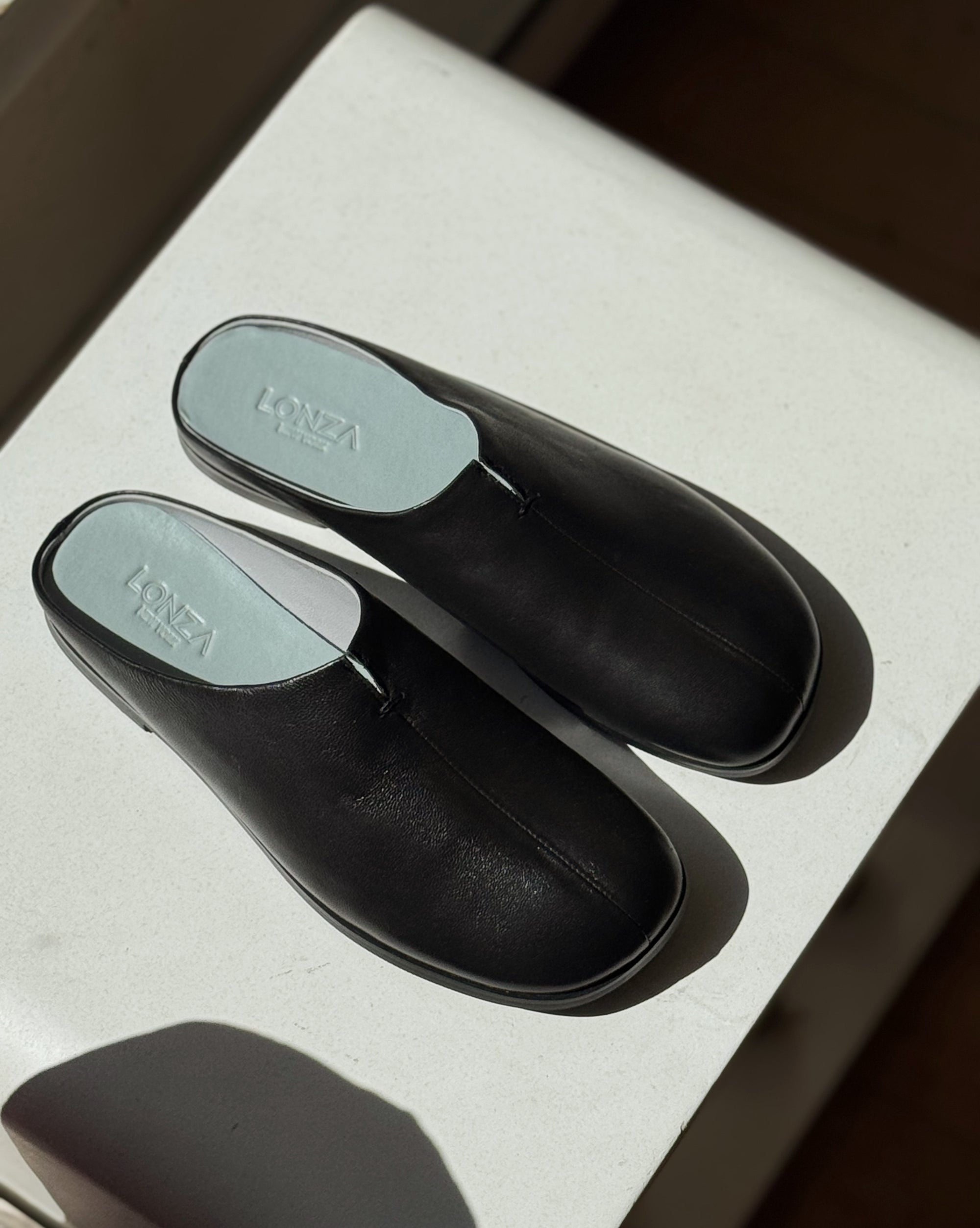 Lonza | Corfu Leather Mules in Black - Hey Jude